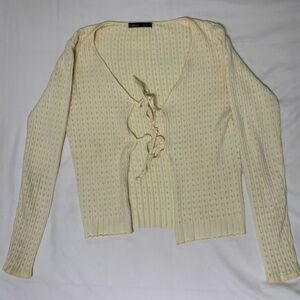 small yellow long sleeve that ties in the front💛